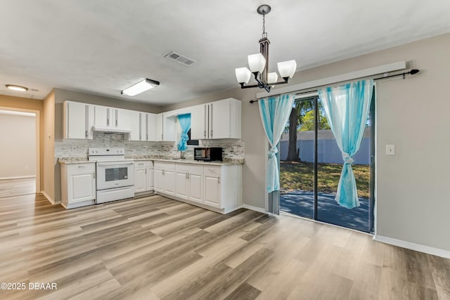 kitchen featuring visible vents, backsplash, white cabinetry, and white electric range