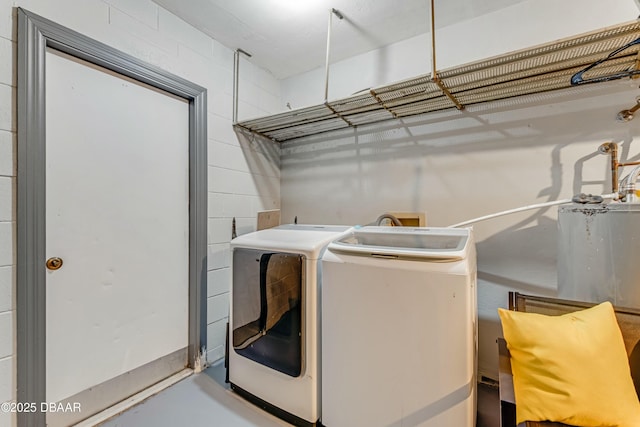 laundry area featuring washer and dryer and laundry area