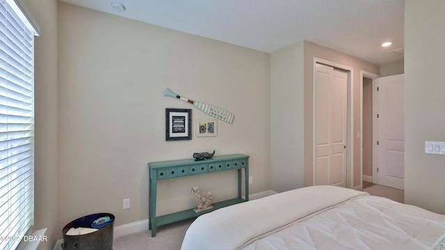 4119 Clifden Dr, Ormond Beach, FL 32174 - bedroom with light colored carpet, baseboards, recessed lighting, and a closet