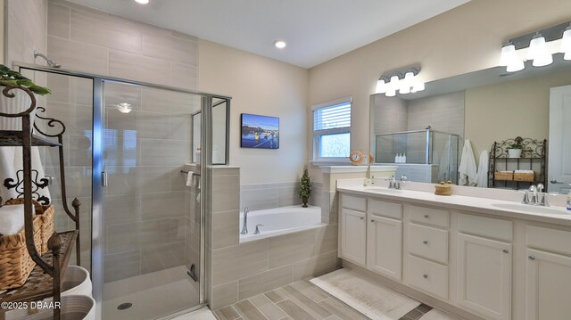 4119 Clifden Dr, Ormond Beach, FL 32174 - full bathroom with a shower stall, double vanity, a bath, and recessed lighting