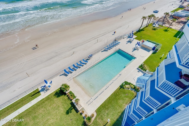 bird's eye view with a beach view and a water view