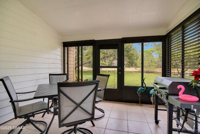 sunroom / solarium with lofted ceiling