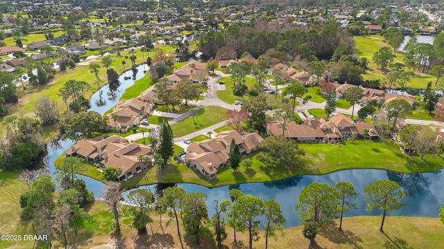 drone / aerial view with a water view