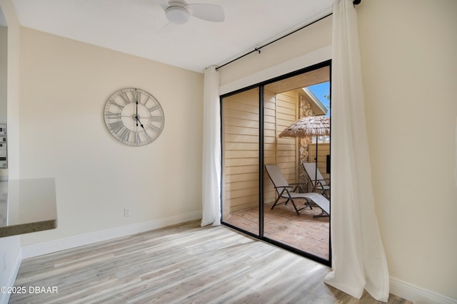 interior space with ceiling fan and light wood-type flooring