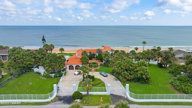 aerial view featuring a water view and a beach view