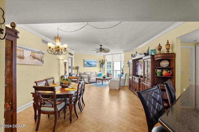 carpeted dining space with ceiling fan with notable chandelier and crown molding