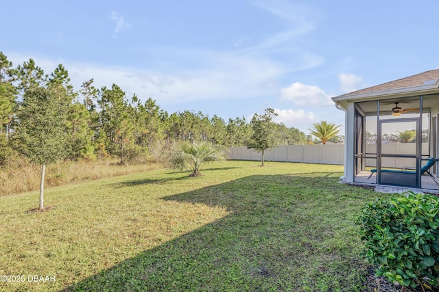 270 Eagle Harbor Way, Daytona Beach, FL 32124 - view of yard with fence, a sunroom, and ceiling fan
