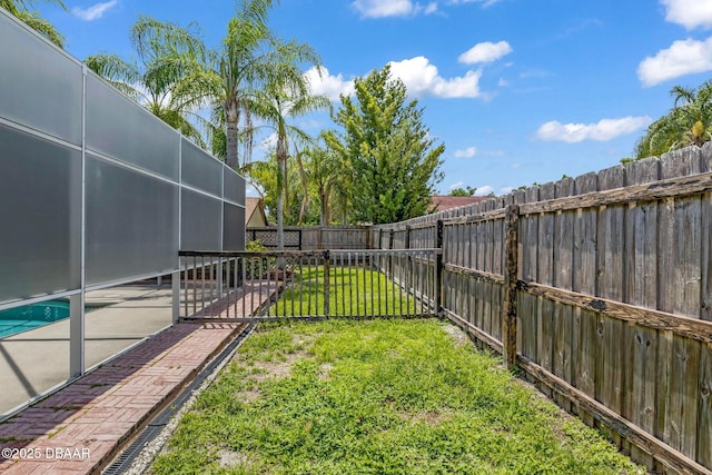 1001 Grassy Rdg, Port Orange, FL 32127 - view of yard featuring a patio area and a lanai