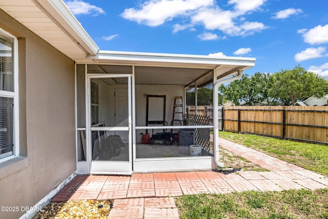 1001 Grassy Rdg, Port Orange, FL 32127 - view of patio / terrace with a sunroom