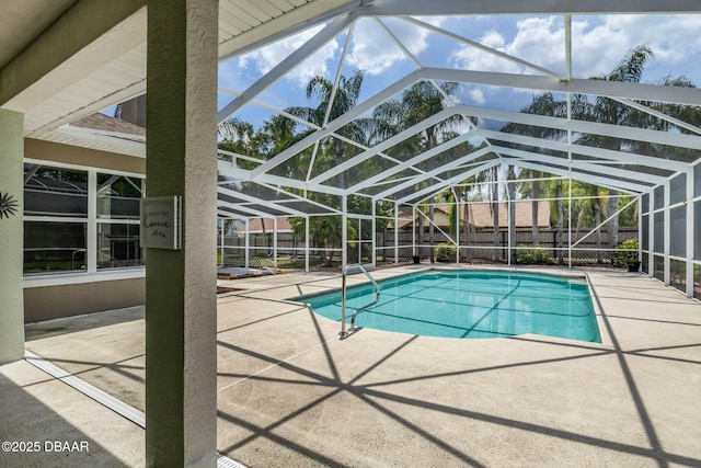 1001 Grassy Rdg, Port Orange, FL 32127 - view of pool featuring a patio area, a fenced backyard, and glass enclosure