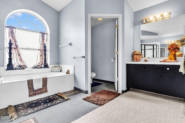 1001 Grassy Rdg, Port Orange, FL 32127 - bathroom featuring lofted ceiling, vanity, a garden tub, and toilet