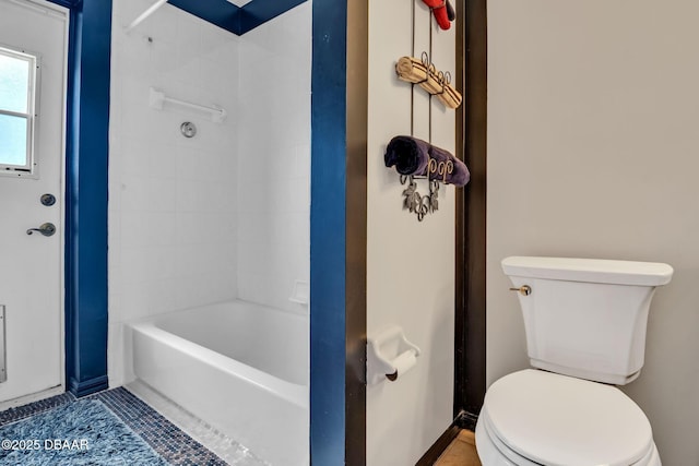 1001 Grassy Rdg, Port Orange, FL 32127 - bathroom with toilet, bathtub / shower combination, baseboards, and tile patterned flooring