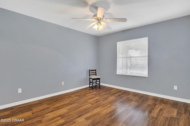 1001 Grassy Rdg, Port Orange, FL 32127 - spare room with a ceiling fan, wood finished floors, and baseboards