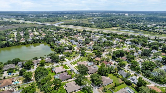 1001 Grassy Rdg, Port Orange, FL 32127 - aerial view of property's location with a large body of water and nearby suburban area