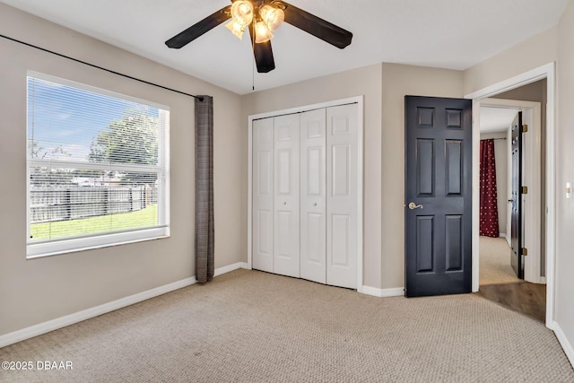 1001 Grassy Rdg, Port Orange, FL 32127 - unfurnished bedroom featuring carpet flooring, baseboards, and multiple windows