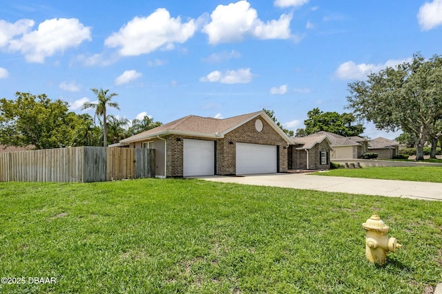 1001 Grassy Rdg, Port Orange, FL 32127 - view of front of house featuring an attached garage, concrete driveway, and brick siding