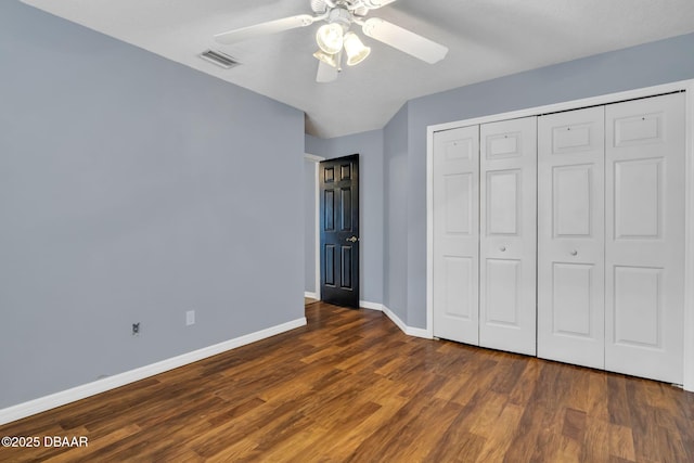 1001 Grassy Rdg, Port Orange, FL 32127 - unfurnished bedroom featuring wood finished floors, baseboards, a closet, and ceiling fan