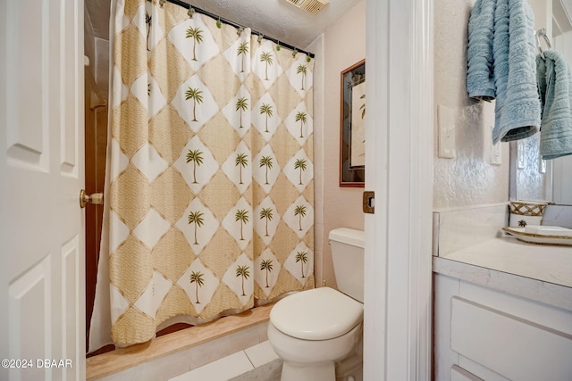 bathroom featuring toilet, tile patterned floors, and curtained shower