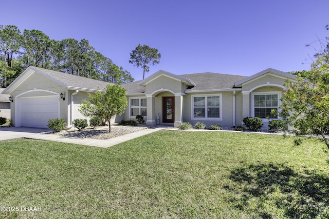 single story home featuring a front yard, an attached garage, driveway, and stucco siding