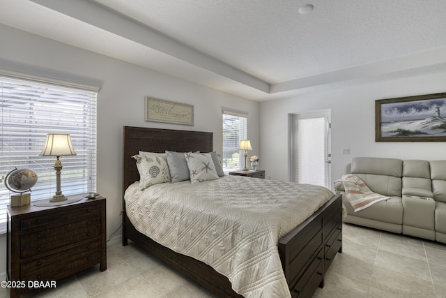 bedroom featuring light tile patterned floors