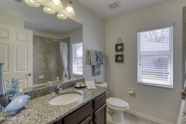 full bathroom with vanity, a shower with curtain, baseboards, visible vents, and toilet