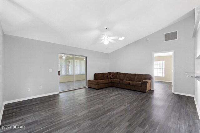 living room with high vaulted ceiling, dark wood-type flooring, and ceiling fan