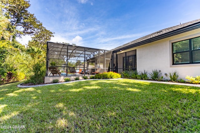 view of yard featuring a lanai