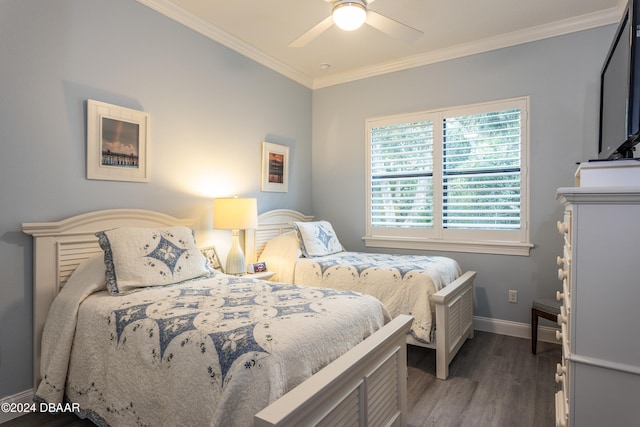 bedroom featuring hardwood / wood-style flooring, ceiling fan, and ornamental molding