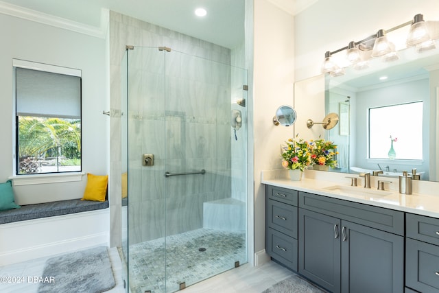 bathroom featuring tile patterned flooring, vanity, crown molding, and walk in shower