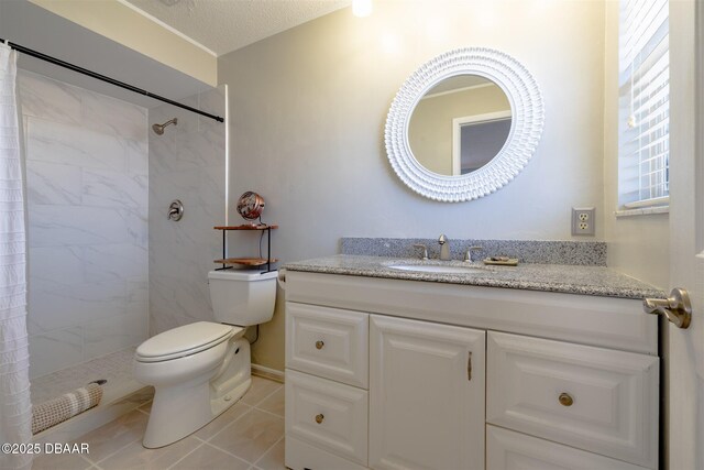 full bath featuring tile patterned floors, toilet, a textured ceiling, a tile shower, and vanity