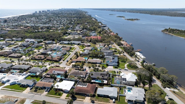 aerial view featuring a residential view and a water view