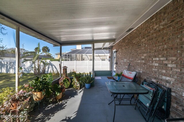 sunroom with a healthy amount of sunlight