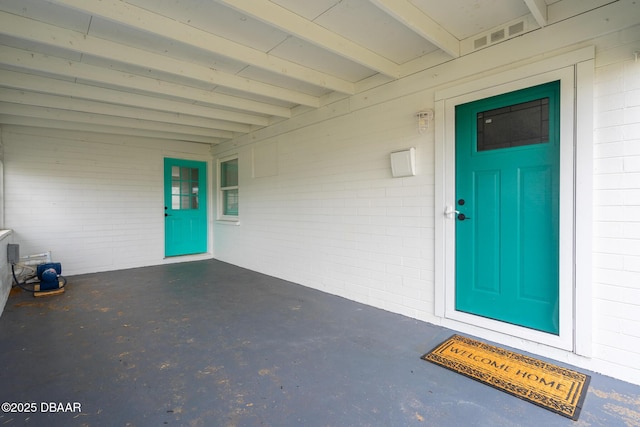 entrance to property with covered porch