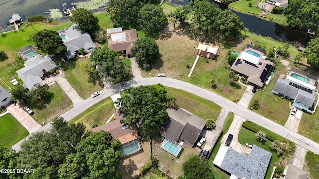 3565 E Lake Dr, Land Olakes, FL 34639 - aerial overview of property's location with nearby suburban area and a nearby body of water
