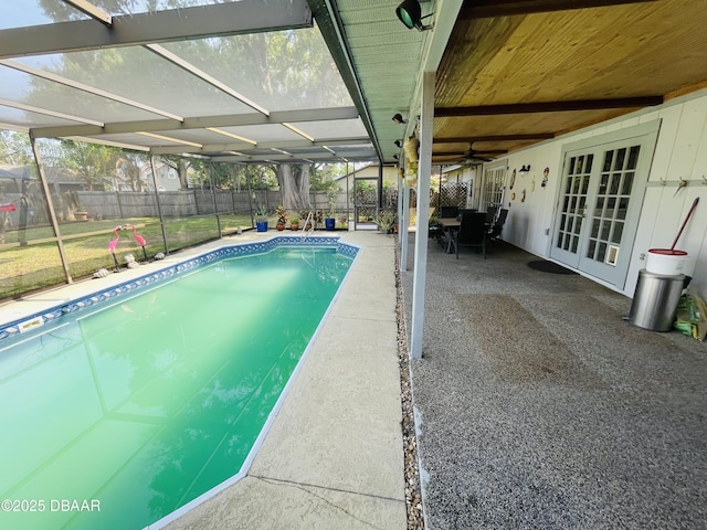 3565 E Lake Dr, Land Olakes, FL 34639 - view of swimming pool with a fenced backyard, a patio area, french doors, and glass enclosure