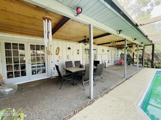 3565 E Lake Dr, Land Olakes, FL 34639 - view of patio / terrace with french doors, ceiling fan, an outdoor pool, and outdoor dining area
