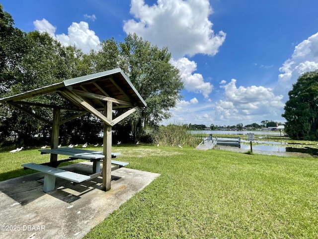 3565 E Lake Dr, Land Olakes, FL 34639 - view of green lawn featuring a water view and a gazebo