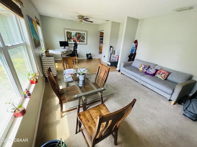 3565 E Lake Dr, Land Olakes, FL 34639 - carpeted dining space with an office area and ceiling fan