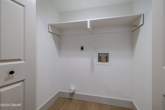 laundry room with light hardwood / wood-style flooring, electric dryer hookup, and hookup for a washing machine