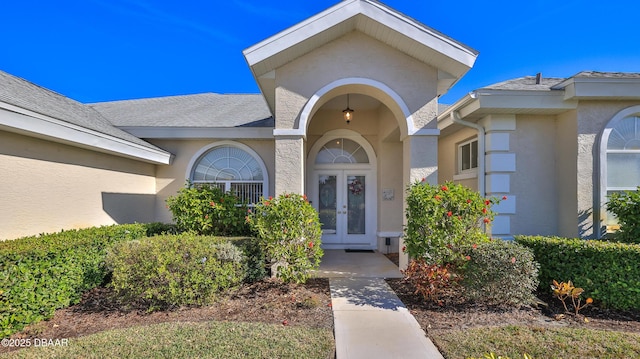 property entrance featuring french doors