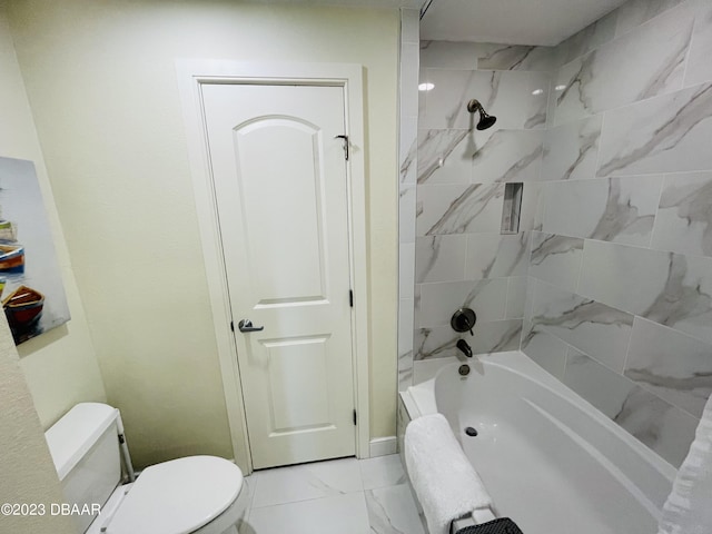 1925 S Atlantic Ave Unit 411, Daytona Beach Shores, FL 32118 - full bathroom featuring marble look tiles, toilet, and tub / shower combination