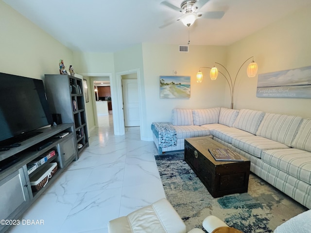 1925 S Atlantic Ave Unit 411, Daytona Beach Shores, FL 32118 - living room featuring marble finish floors and a ceiling fan