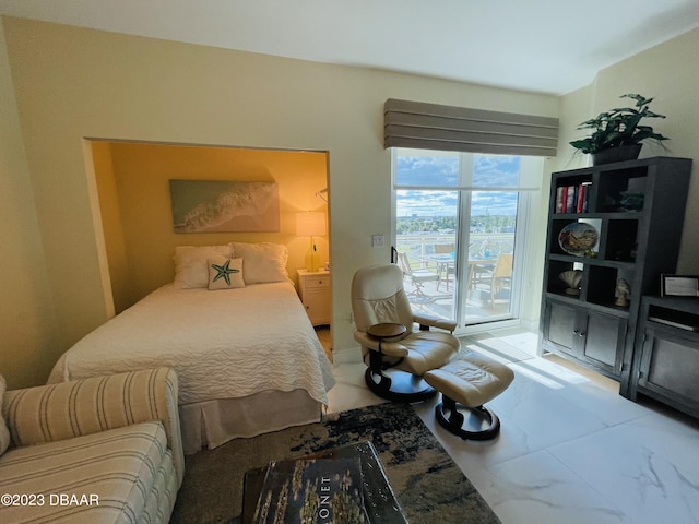 1925 S Atlantic Ave Unit 411, Daytona Beach Shores, FL 32118 - bedroom featuring access to outside