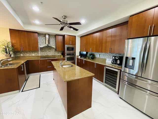 1925 S Atlantic Ave Unit 411, Daytona Beach Shores, FL 32118 - kitchen featuring stainless steel appliances, wine cooler, wall chimney exhaust hood, light stone counters, and backsplash