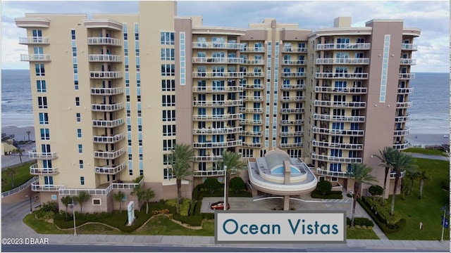 1925 S Atlantic Ave Unit 411, Daytona Beach Shores, FL 32118 - view of apartment building / complex with a water view