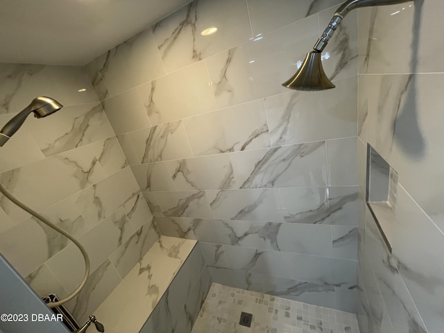 1925 S Atlantic Ave Unit 411, Daytona Beach Shores, FL 32118 - bathroom with tiled shower
