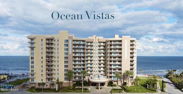1925 S Atlantic Ave Unit 411, Daytona Beach Shores, FL 32118 - view of apartment building / complex with a water view