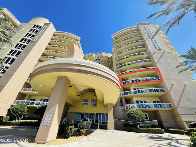 1925 S Atlantic Ave Unit 411, Daytona Beach Shores, FL 32118 - view of apartment building / complex