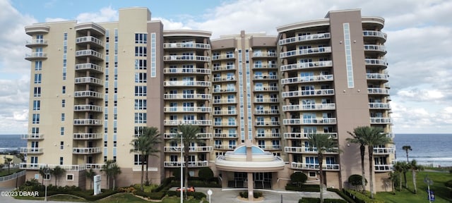 1925 S Atlantic Ave Unit 411, Daytona Beach Shores, FL 32118 - view of apartment building / complex with a water view