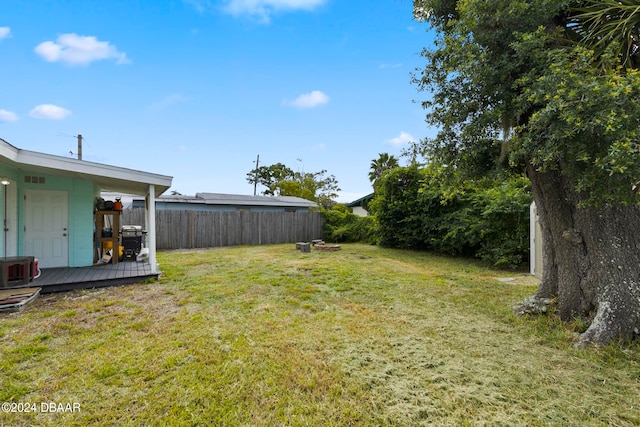 view of yard featuring a deck